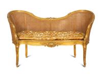A Louis XV Style Caned Giltwood Settee