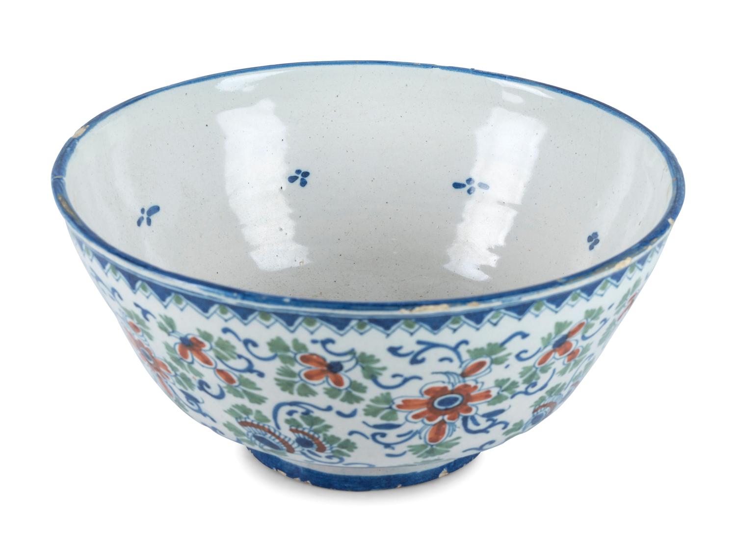 A Dutch Delft Polychrome Glazed Earthenware Punch Bowl