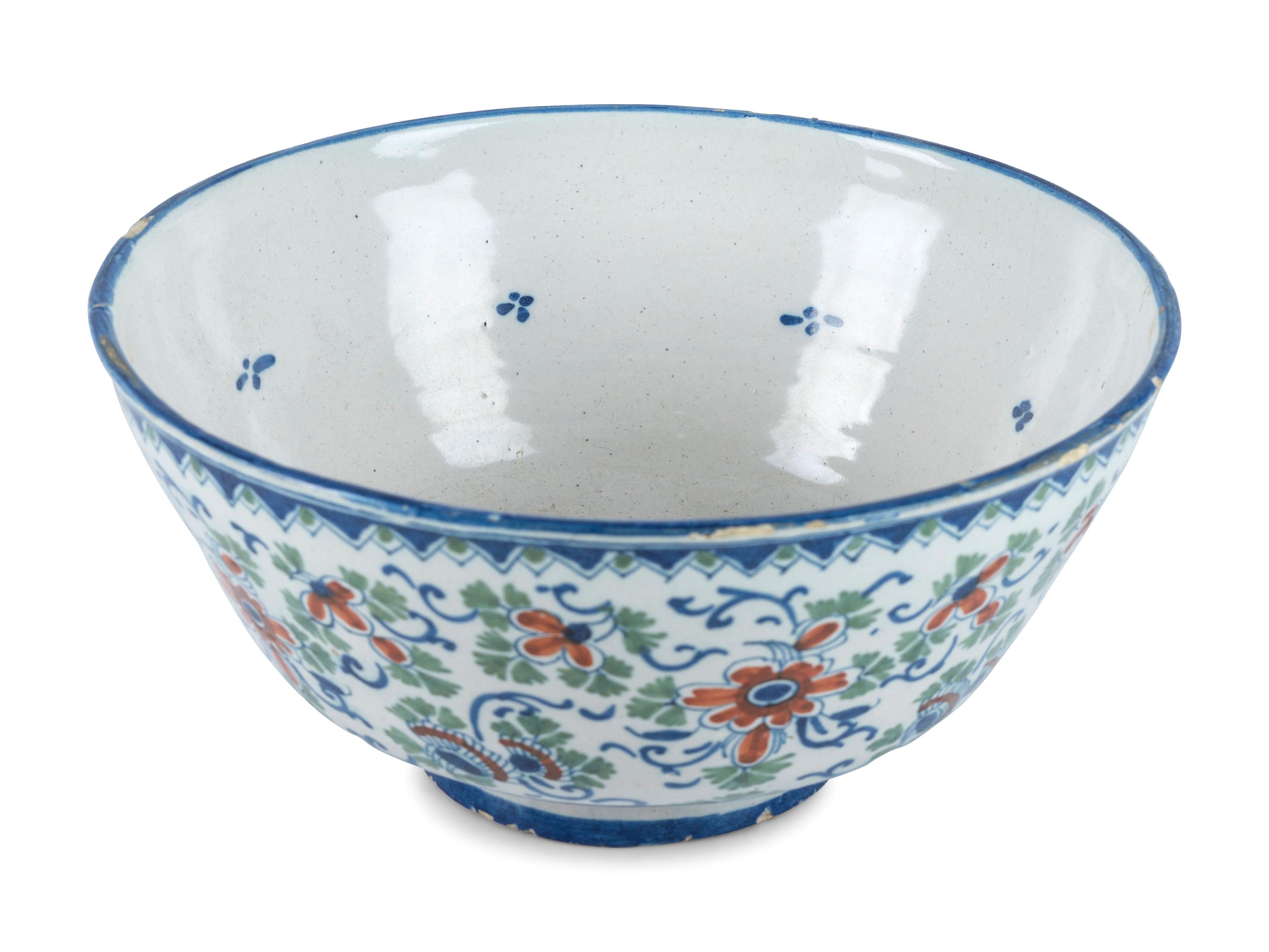 A Dutch Delft Polychrome Glazed Earthenware Punch Bowl