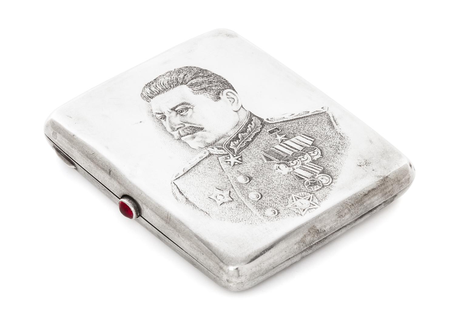 A Russian Niello Silver Cigarette Case, Mark of a Jewelers Artel, Moscow, 20th century, the lid worked to show the Kremlin viewed from