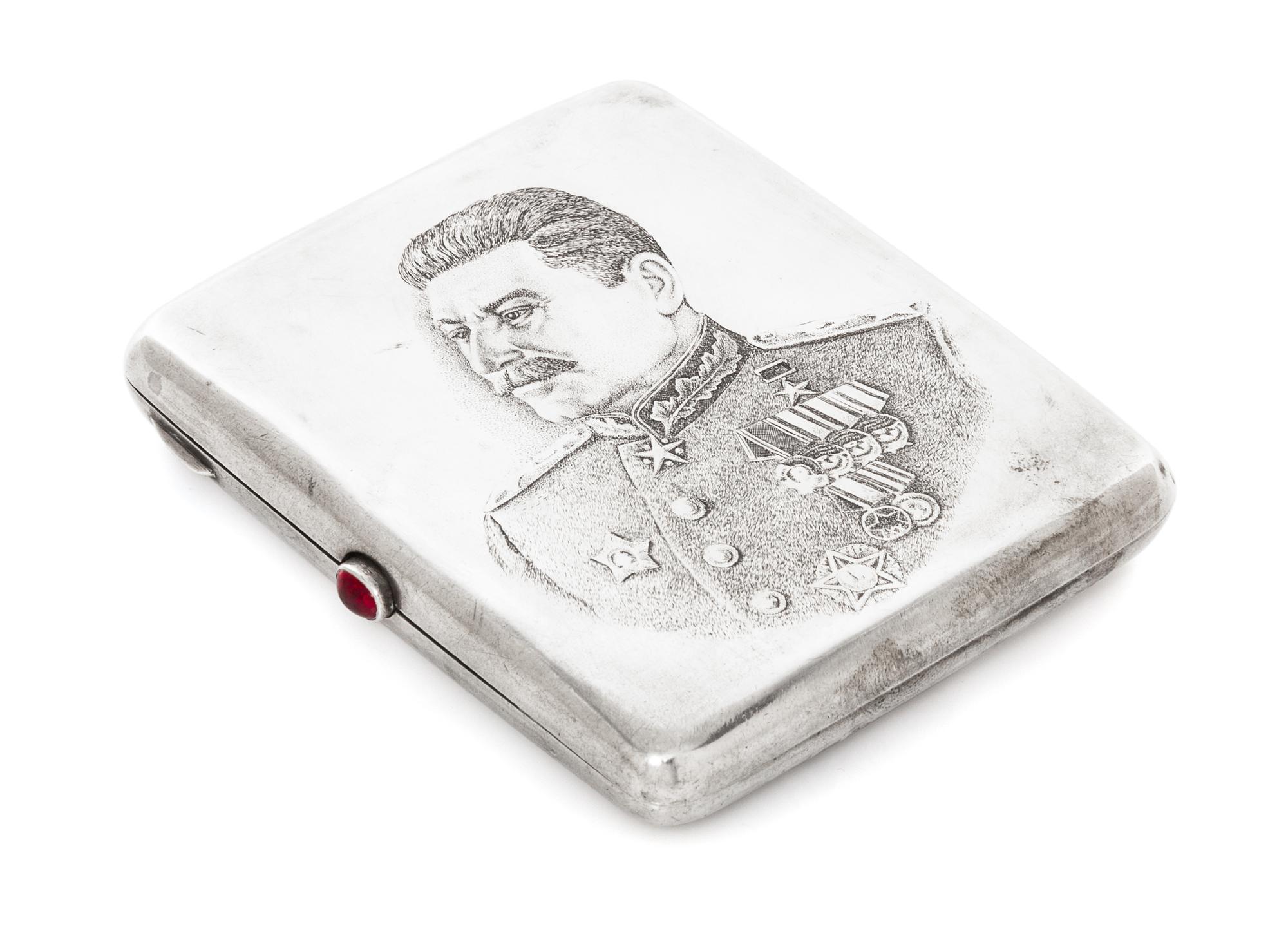 A Russian Niello Silver Cigarette Case, Mark of a Jewelers Artel, Moscow, 20th century, the lid worked to show the Kremlin viewed from