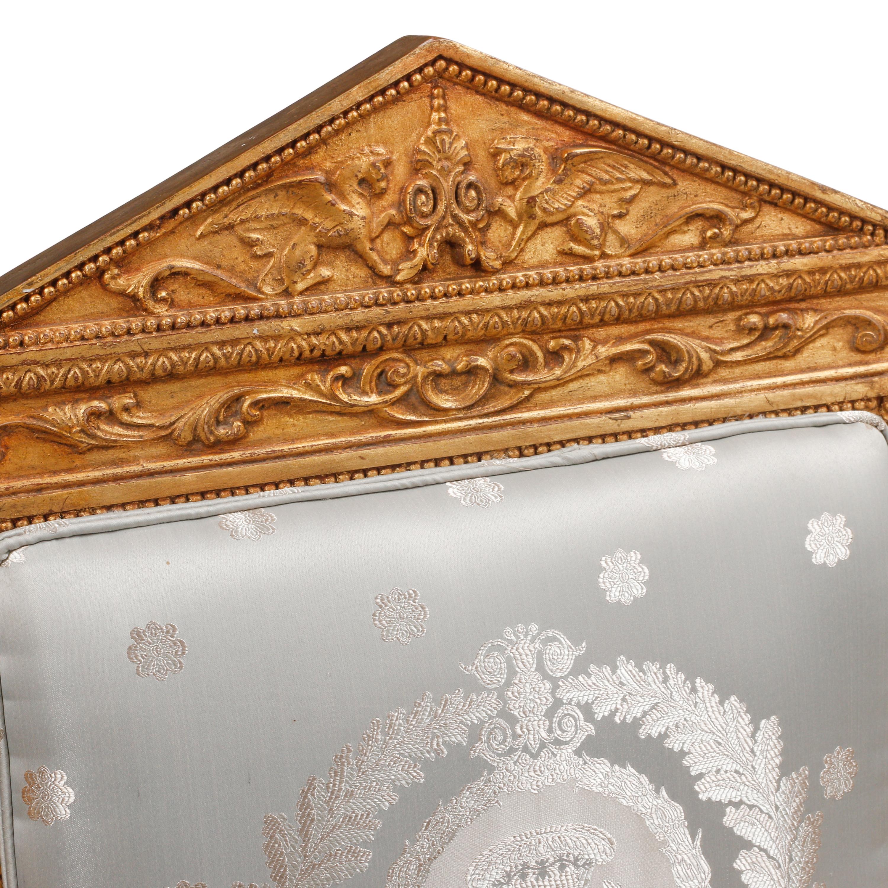 An Italian Neoclassical Style Carved Three-Piece Seating Suite