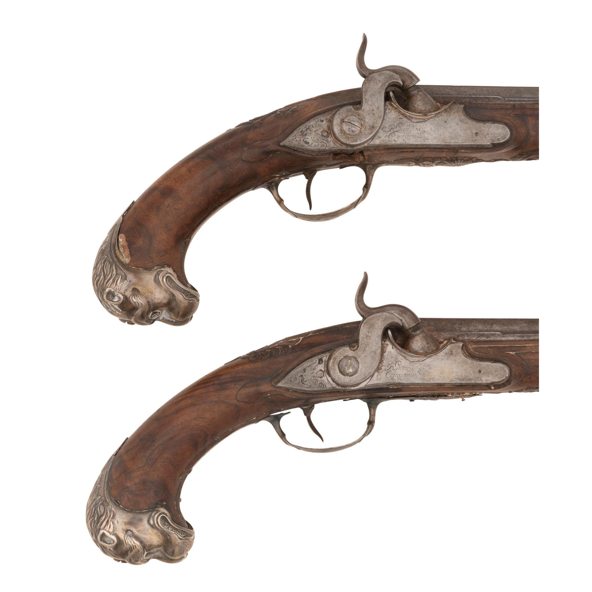 A Pair of Silver Mounted French Percussion Pistols