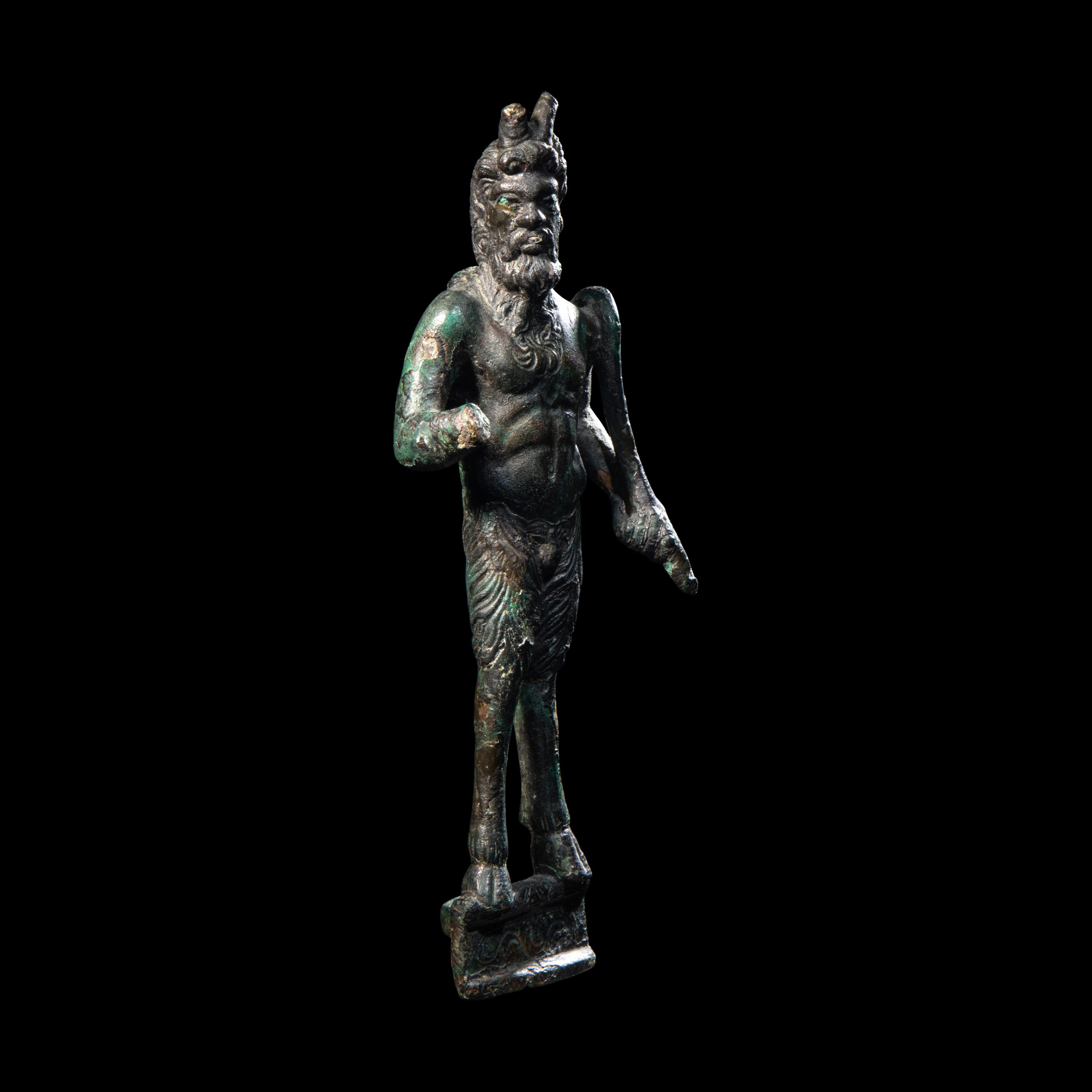 A Roman Bronze Satyr
