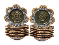 A Set of Fourteen MacKenzie-Childs Evervolving Ceramic Bowls