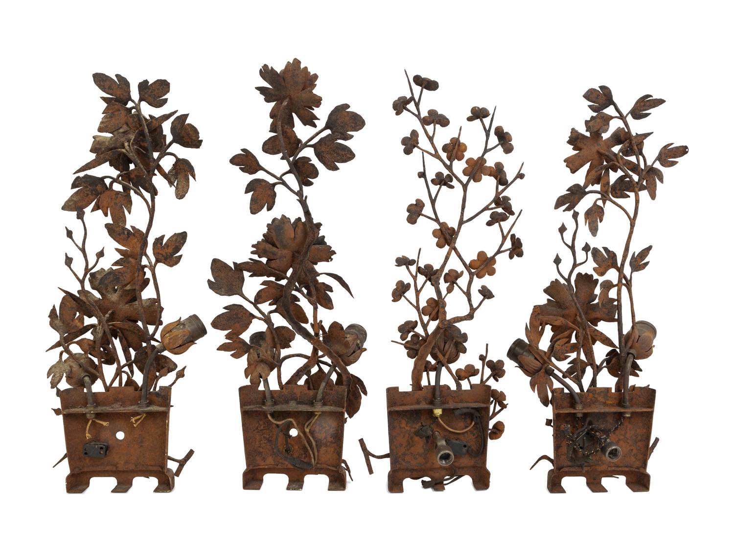 A Set of Four Chinese Cast Iron Wall Sconces