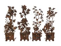 A Set of Four Chinese Cast Iron Wall Sconces