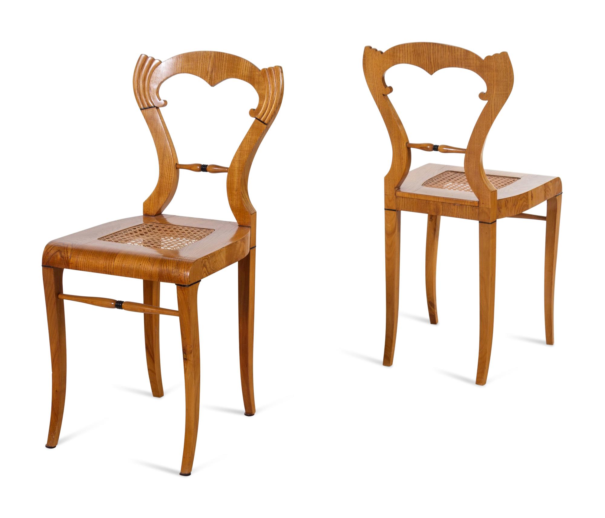 A Set of Four Biedermeier Oak Side Chairs
