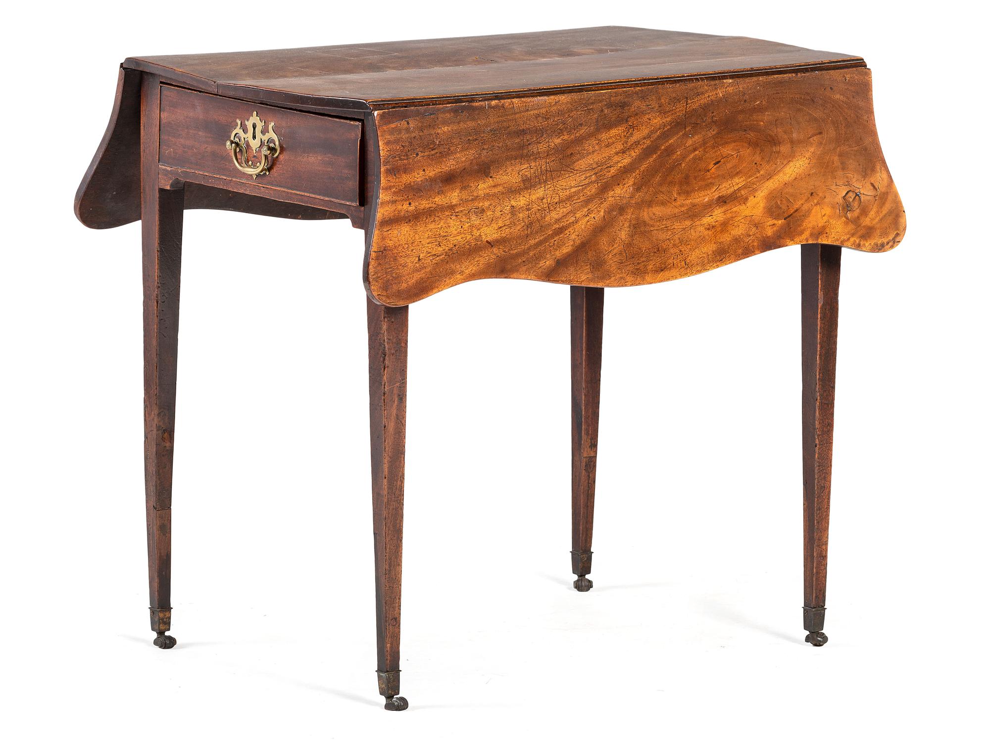 An English Mahogany Drop Leaf Table