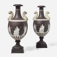 A Pair of Wedgwood Black Dip Jasperware and Black Basalt "Panther" Vases UK, late 19th century