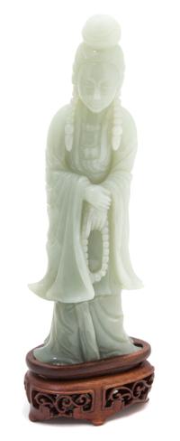 A Carved Celadon Jade Figure of Guanyin — 19TH CENTURY
