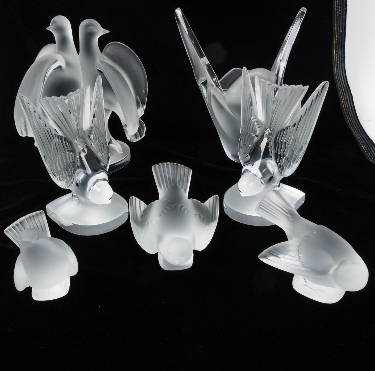 A Collection of Lalique Bird Figures Height of tallest 5 inches.