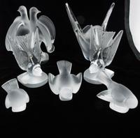 A Collection of Lalique Bird Figures Height of tallest 5 inches.