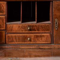 A William & Mary walnut double dome secretary bureau circa 1710