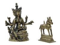 A Tibetan Gilt Bronze Multi-Armed Deity, Height 6 1/2 inches.