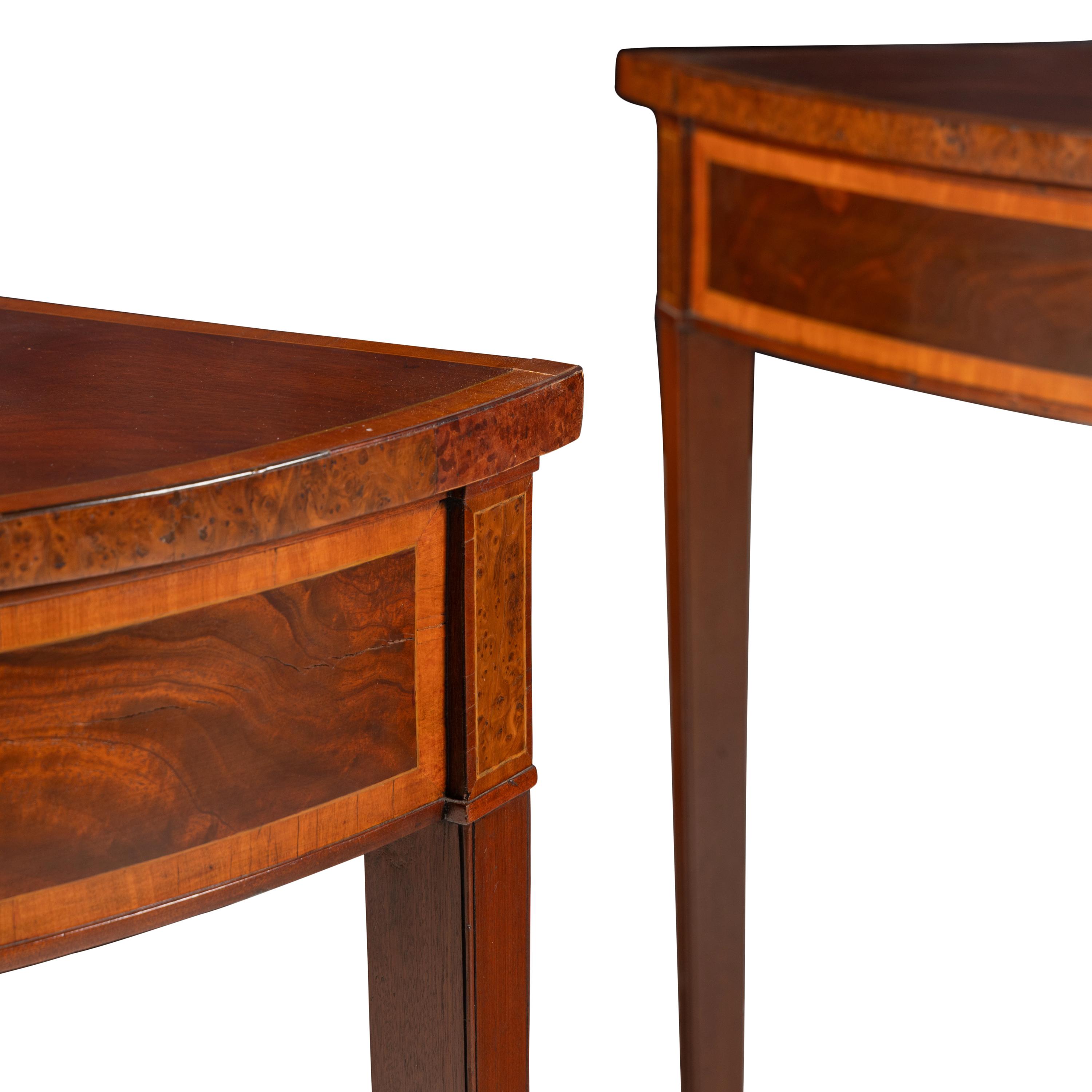 A Pair of Late George III Mahogany, Satinwood and Yew Wood Console Tables