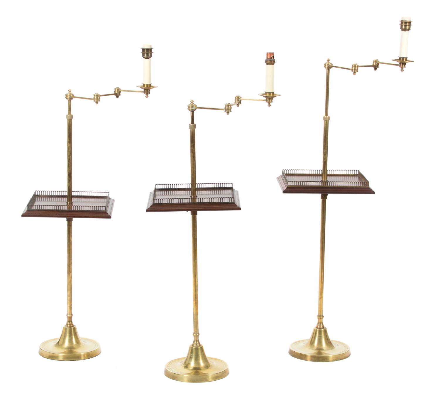 A Collection of Three Vaughan Brass Floor Lamps Height of tallest (to top of candlestick) 50 inches. — 20TH CENTURY