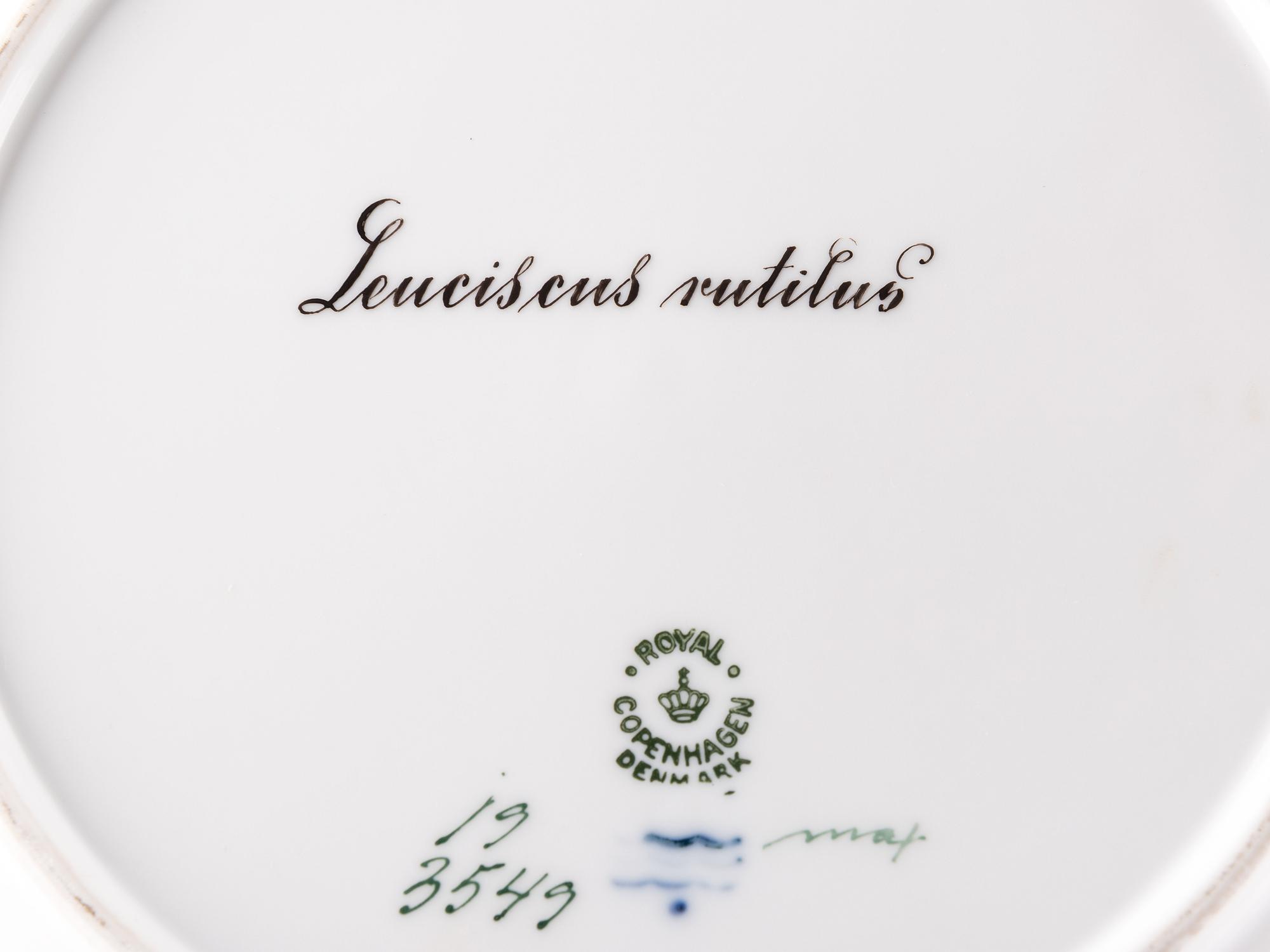 A Set of Twelve Royal Copenhagen Parcel Gilt Porcelain Fish Plates