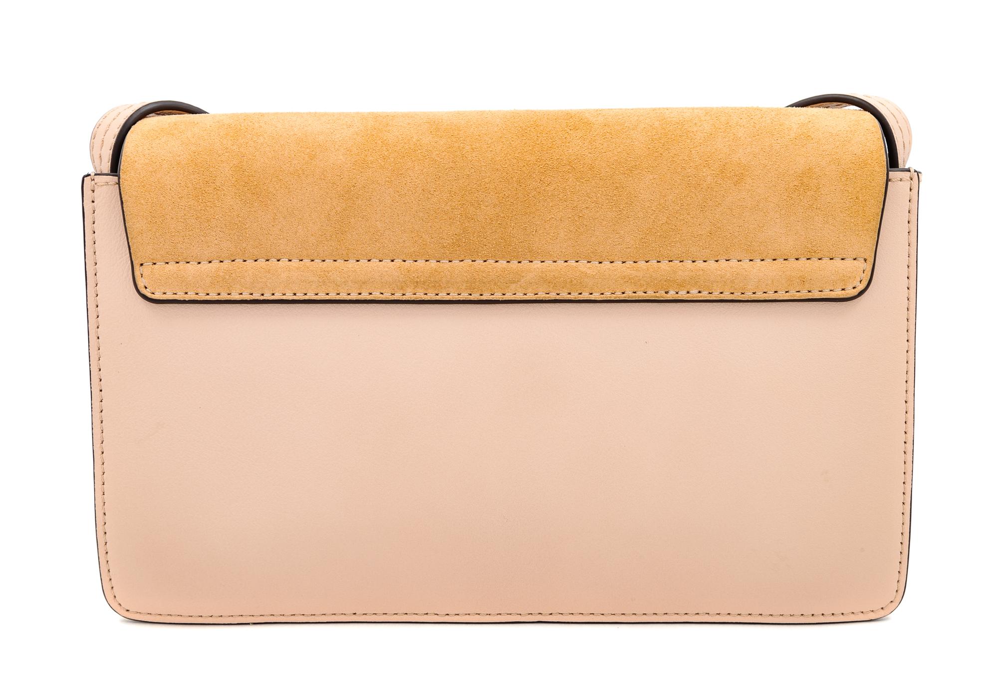 A Chloe Cement Pink Faye Small Shoulder Bag, 6.3" H x 9.4" W x 3.5" D; Strap drop: 20.1"-22.4".