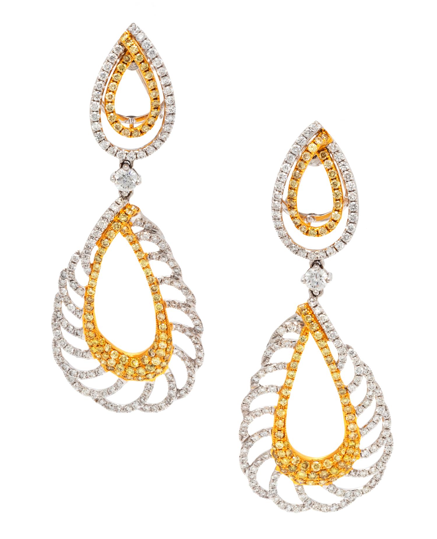 A Pair of Bicolored Gold, Diamond and Yellow Diamond Earrings, 14.20 dwts.