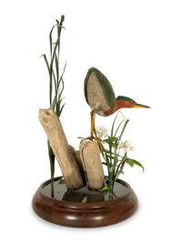 A Carved and Painted Shore Bird in Naturalistic Setting