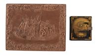 [EARLY PHOTOGRAPHY - PORTRAITURE]. A pair of daguerreotypes featuring a father holding his daughter on his lap, with hand painted and other cases, including: