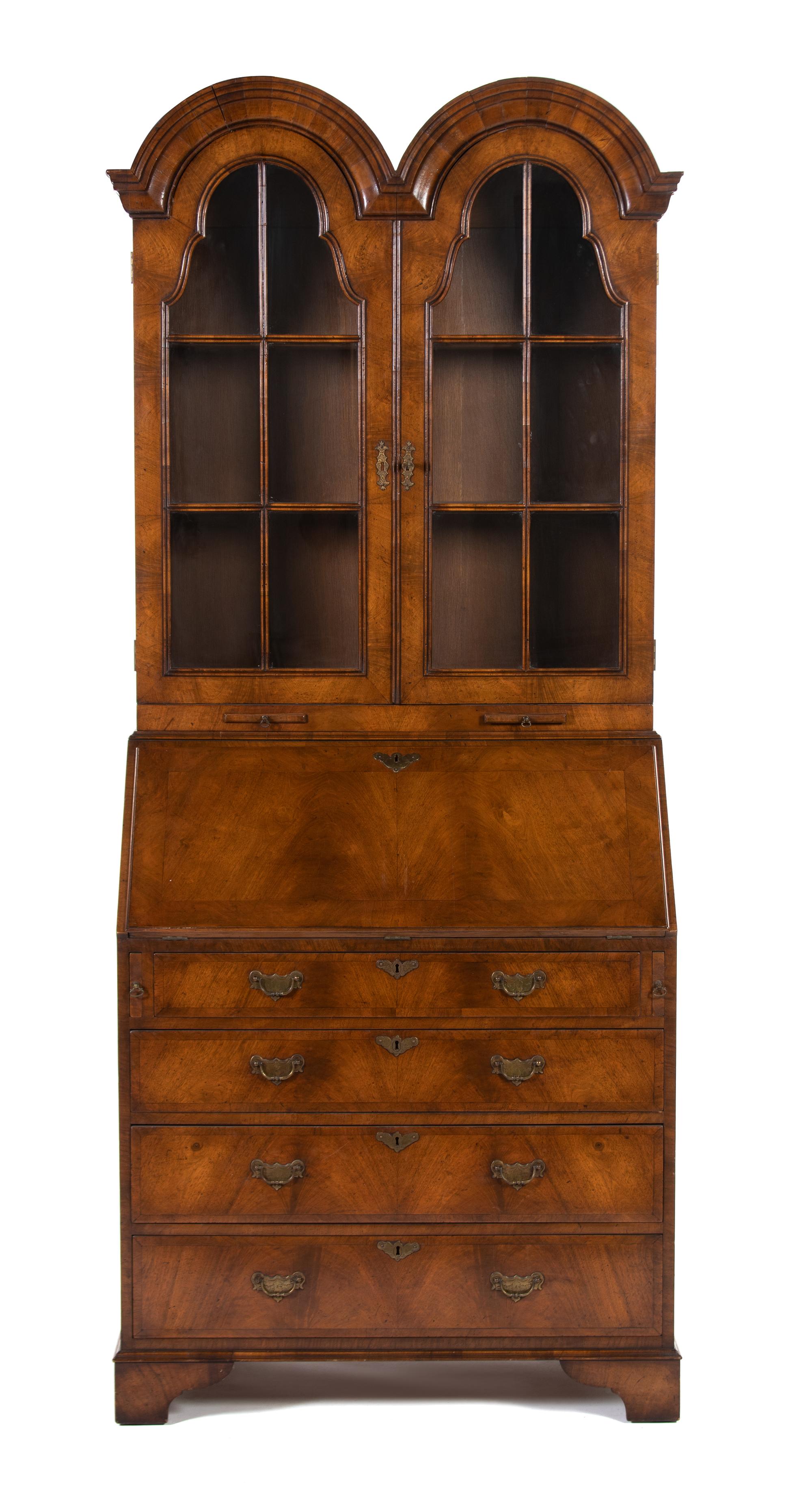 A William & Mary Style Walnut Double Dome Secretary Bookcase