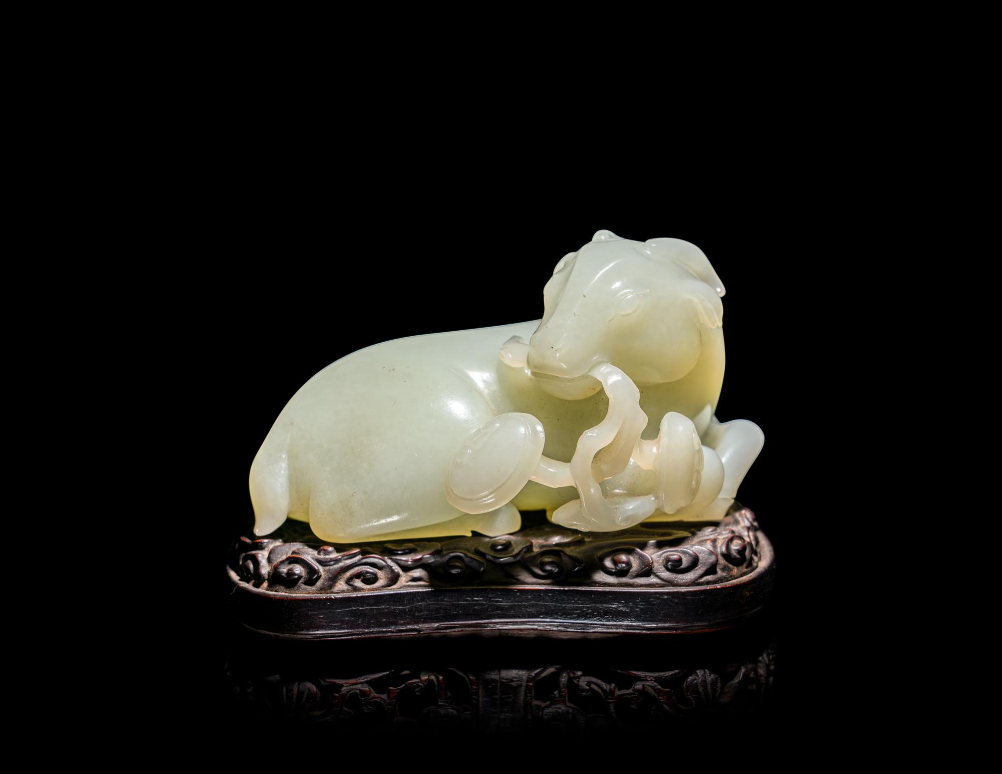 A Chinese Celadon Jade Figure of a Recumbent Ram