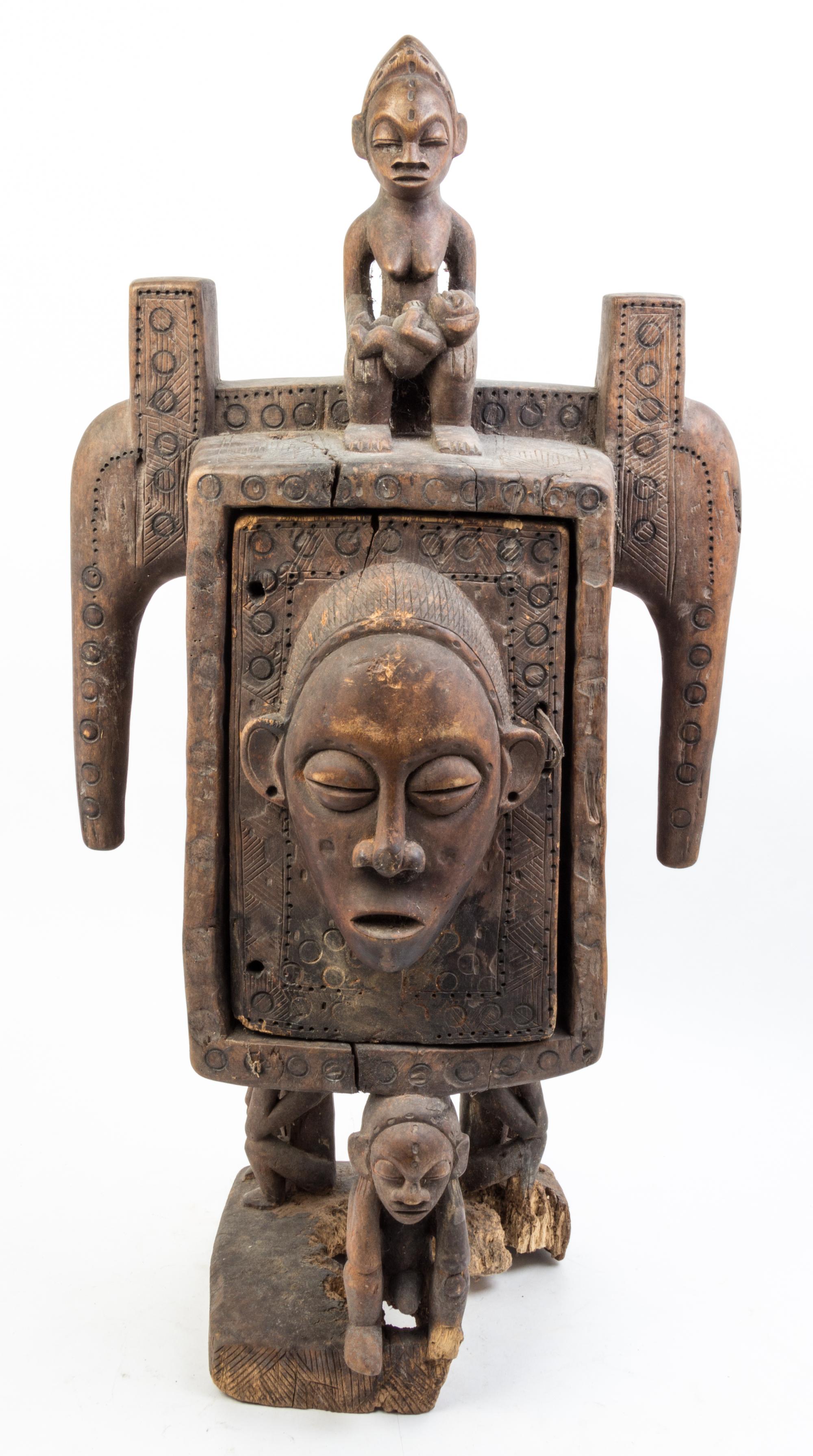 A Carved Wood Figural Container Height 35 1/2 inches.