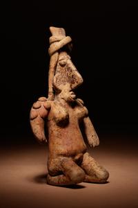 A Jalisco Terracotta Kneeling Figure