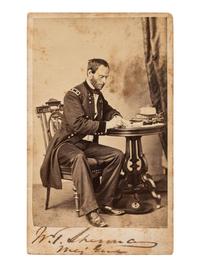 [SHERMAN, William Tecumseh (1820-1891)]. Signed CDV of Sherman as major general, seated at a desk. Chicago: S.M. Fassett, n.d.