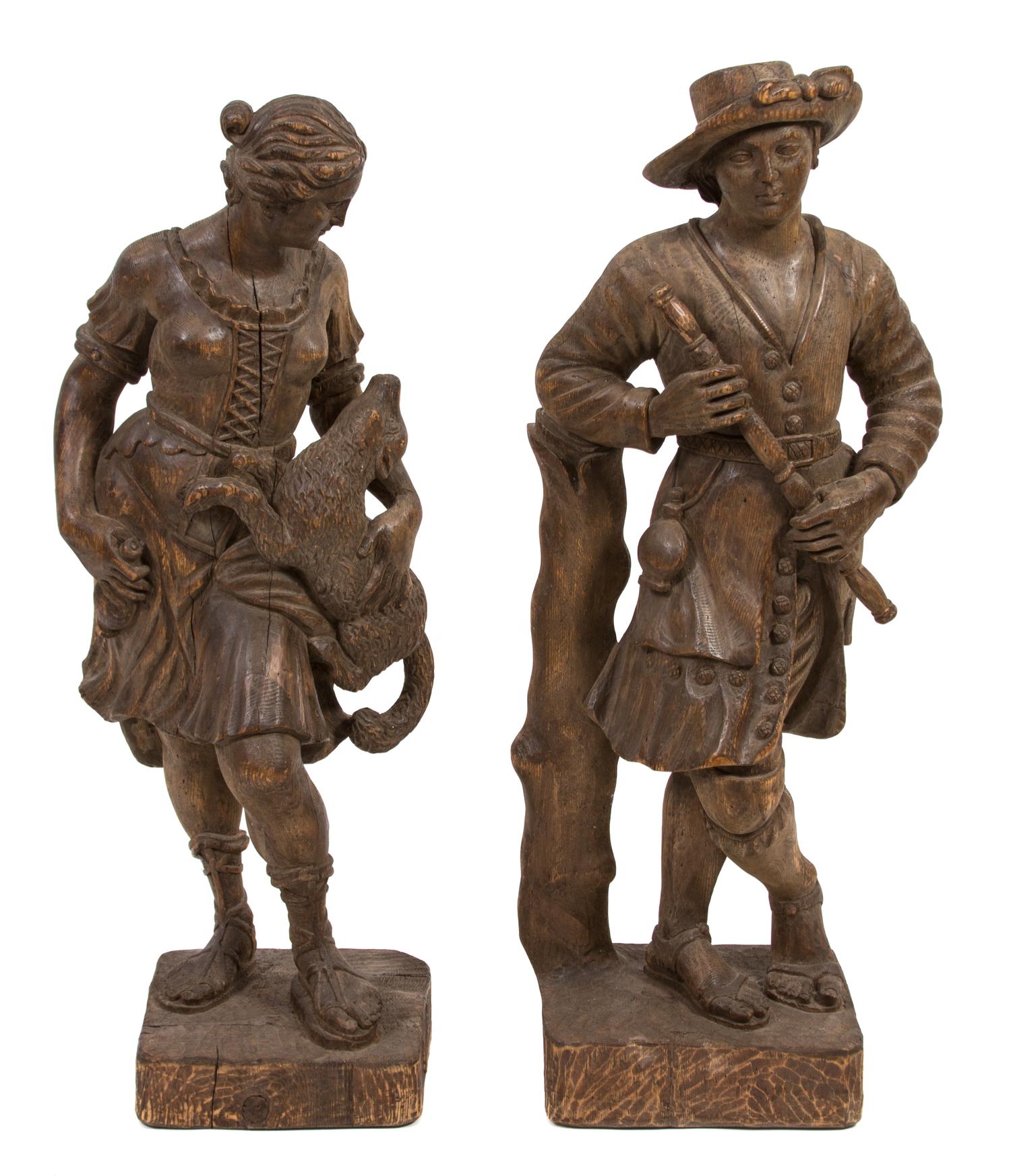 Two Carved Oak Figures Height of taller 42 1/2 inches. — 20TH CENTURY