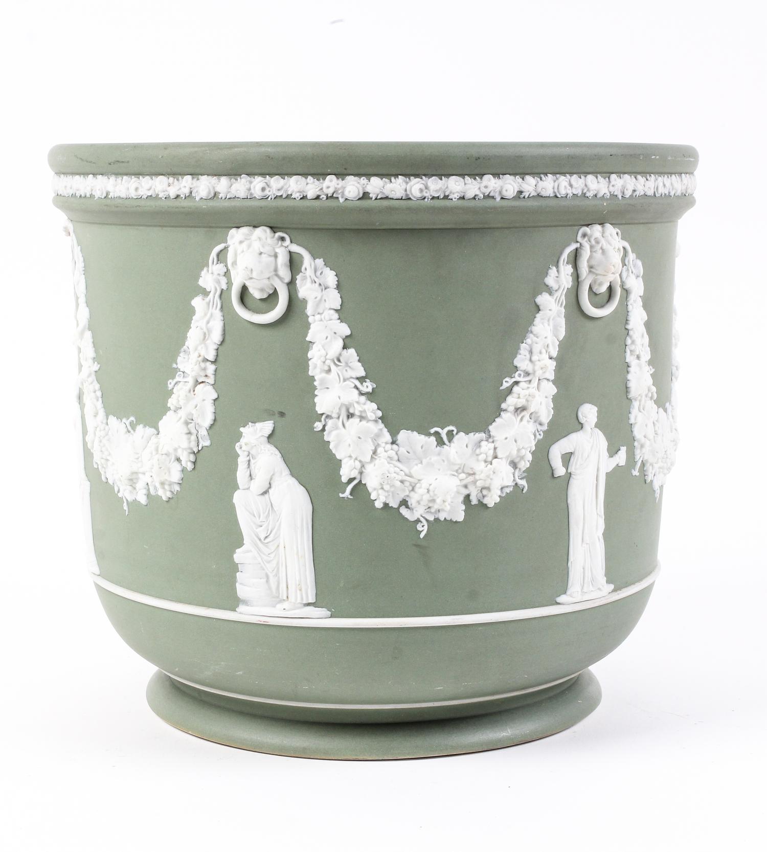 A Wedgwood Jasperware Jardinière Height 9 inches.