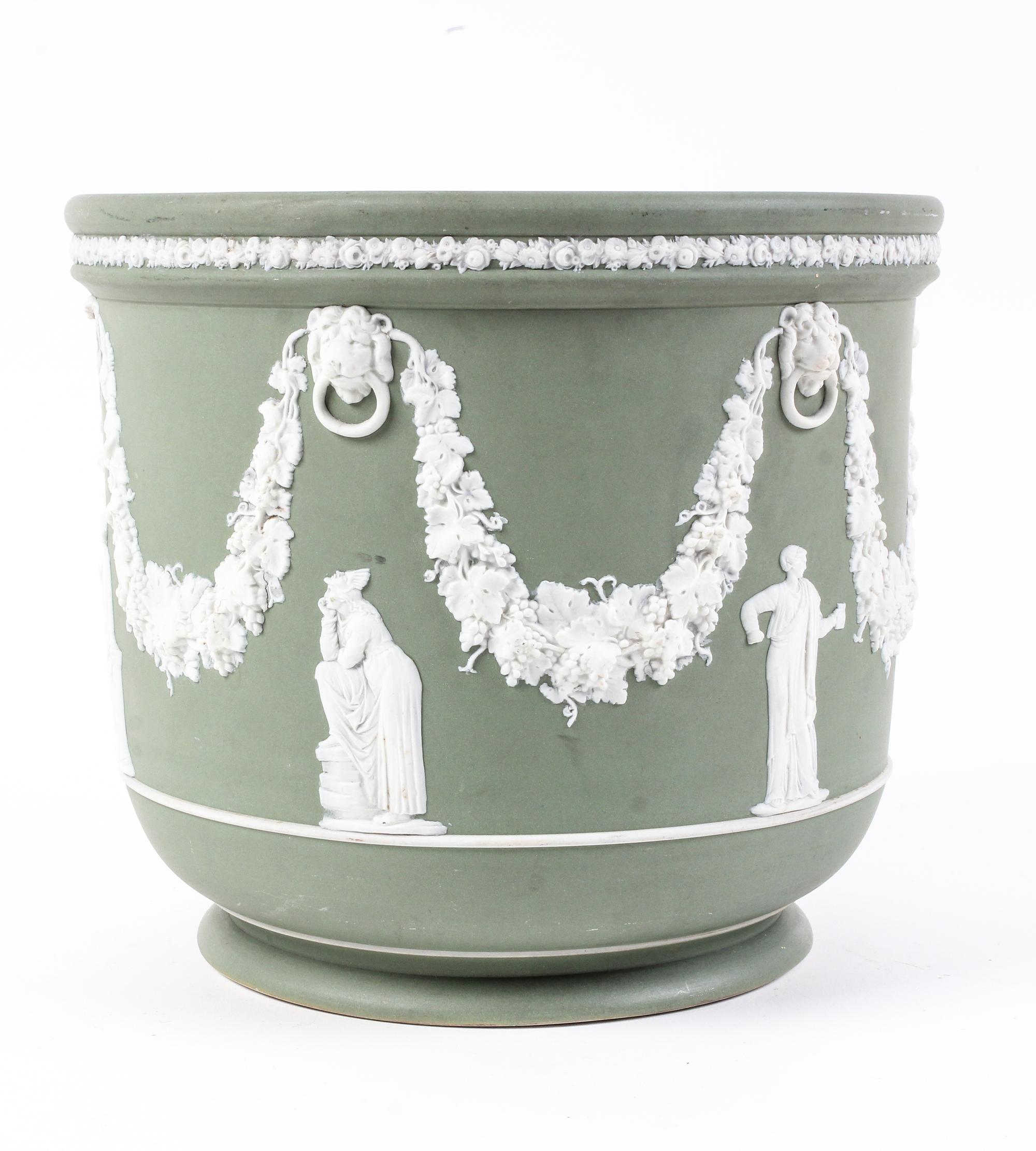 A Wedgwood Jasperware Jardinière Height 9 inches.