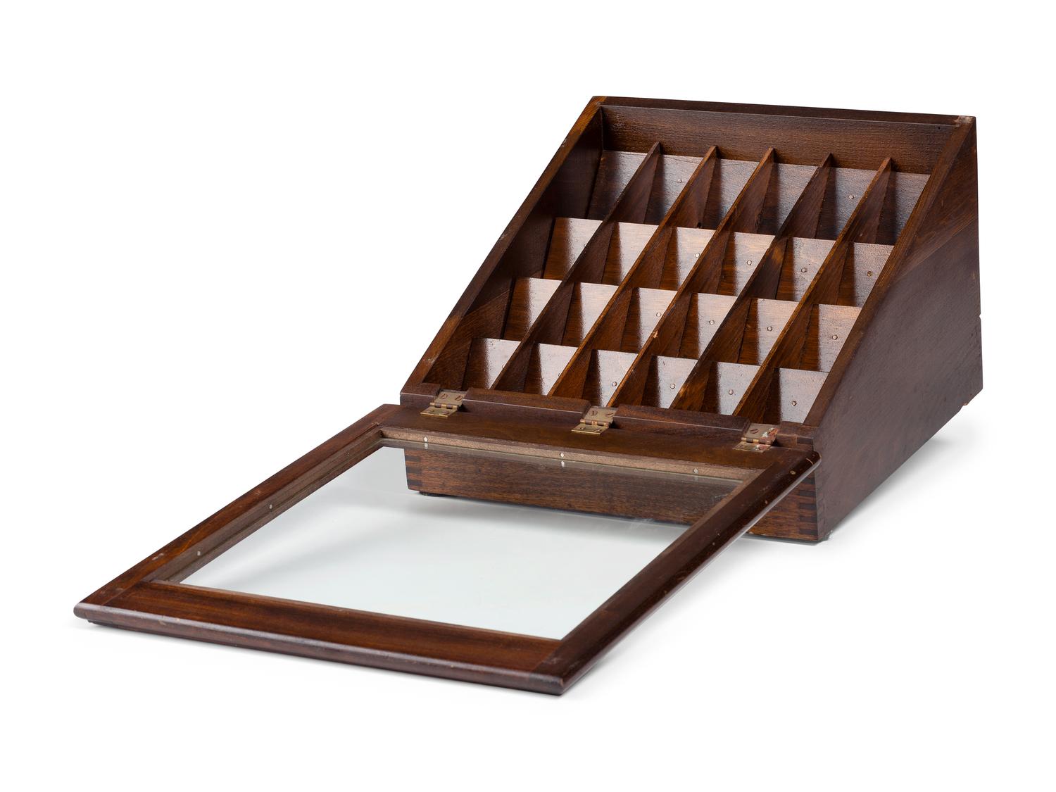 A Milward's English Needles Countertop Display Case