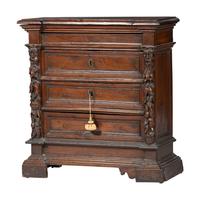 A Continental Floral Carved Walnut Diminutive Chest
