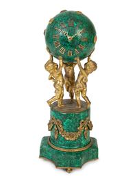 A French Empire Style Gilt Bronze Mounted Malachite Clock — 19TH CENTURY