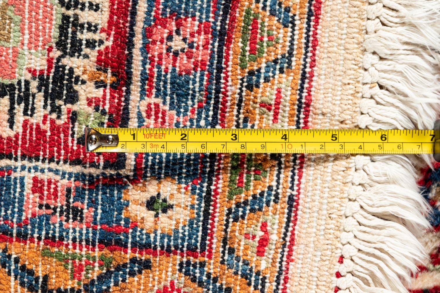 A Kirman Wool Rug
