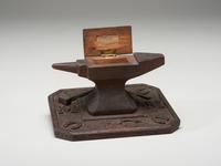 A Folk Art Carved and Stained Wood Anvil and Hammer Form Box