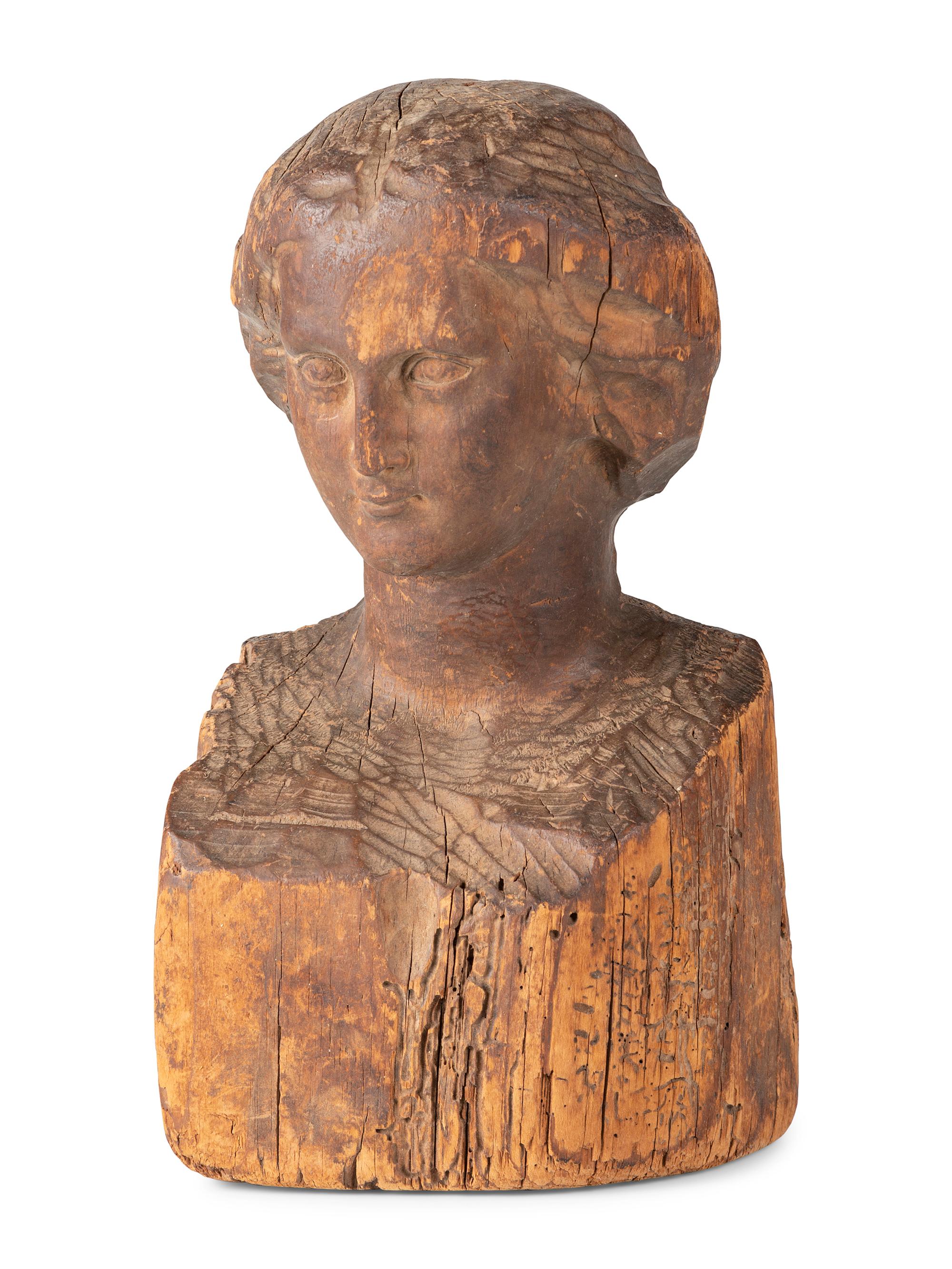 A Folk Art Carved Wood Female Head