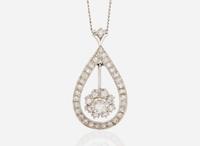 A Set of 14K White Gold and Diamond Earrings and Necklace