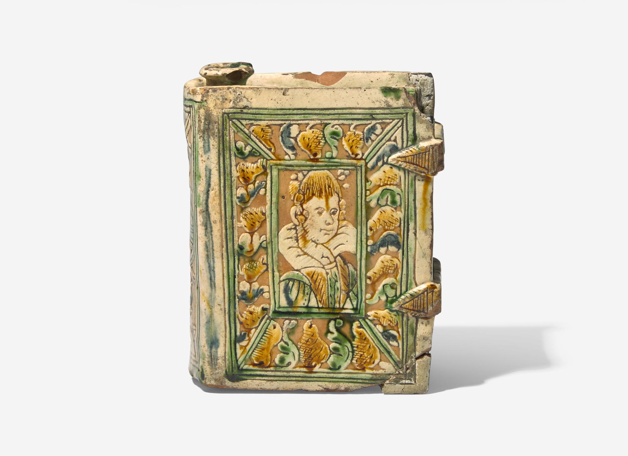A Continental Faience Pottery Book-Form Flask