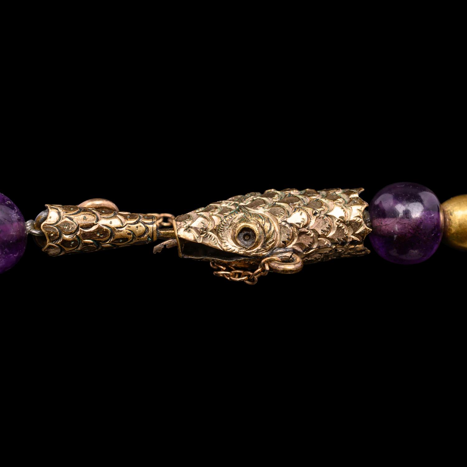 A Necklace of Amethyst and Gold Beads