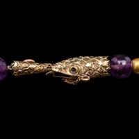 A Necklace of Amethyst and Gold Beads