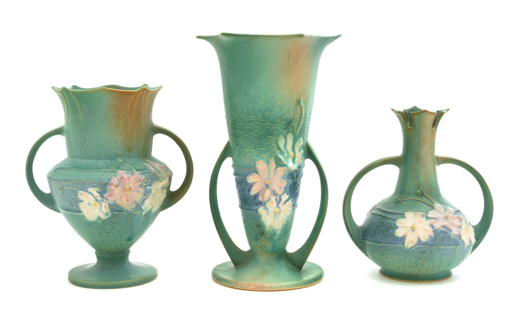 Three Roseville Cosmos Pottery Vases Height of tallest 10 1/4 inches.