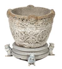 A Poured Cement Garden Pot Height 15 1/2 x diameter 20 inches.