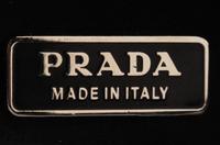 Three Designer Leather Clutches: Two Prada, One Rena Lange