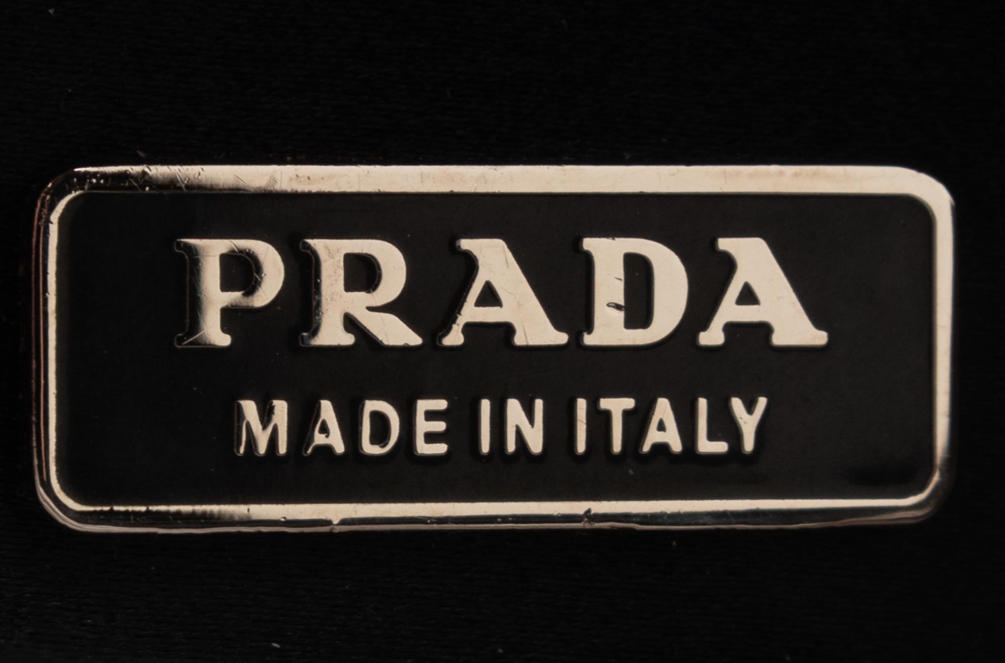 Three Designer Leather Clutches: Two Prada, One Rena Lange