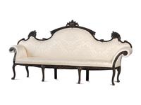 An Italian Carved and Black Painted Walnut High-Back Sofa