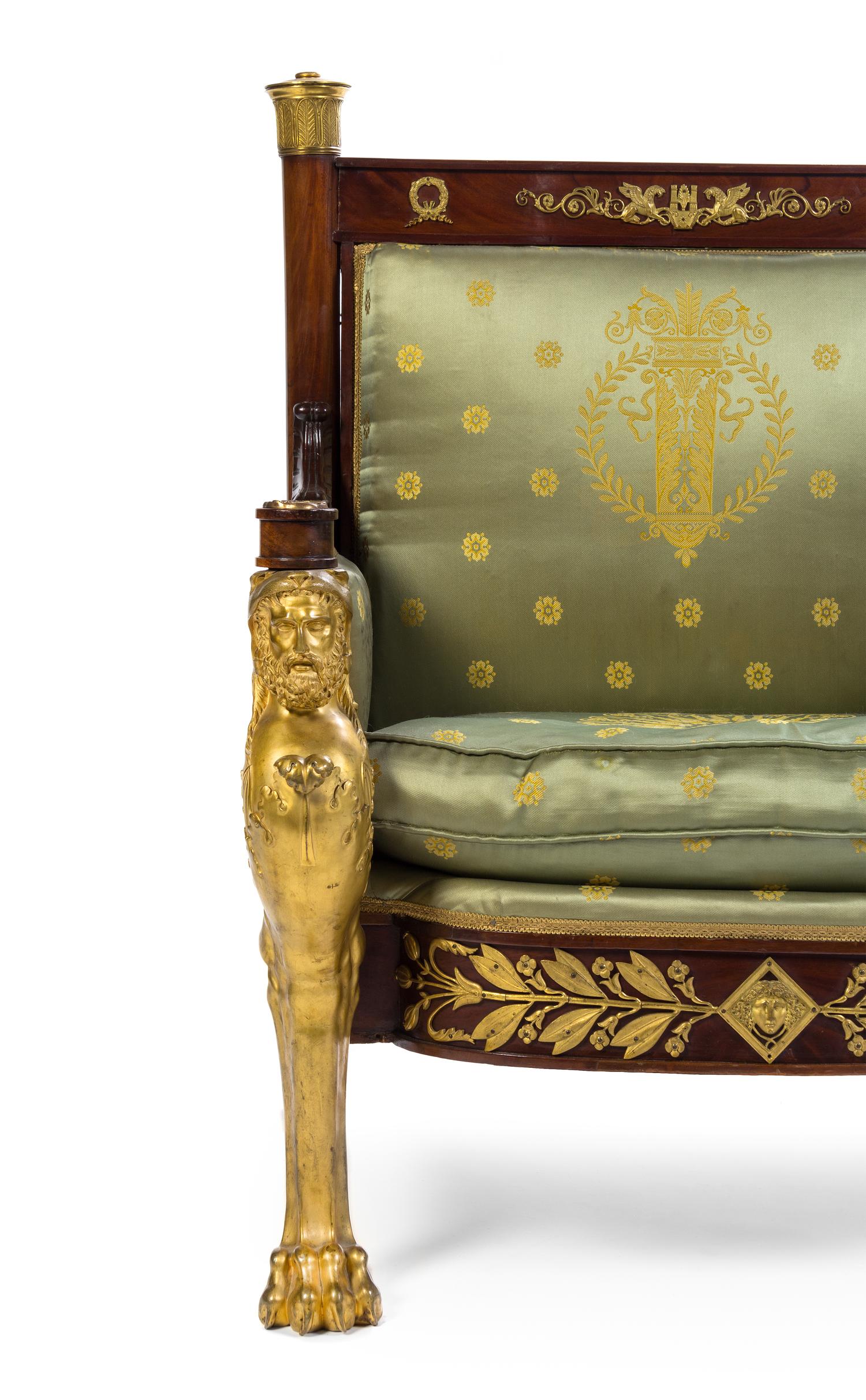 An Empire Gilt Bronze Mounted Mahogany Bergere Height 40 inches. — EARLY 19TH CENTURY